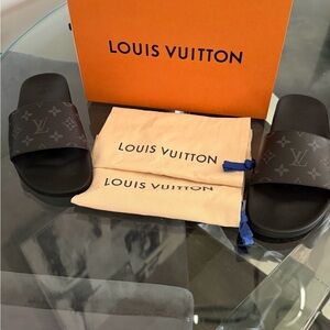 Louis Vuitton black leather with gray monogram slides. 100% Autthentic